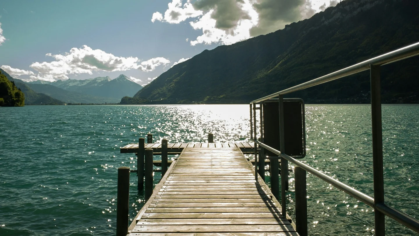 Wooden jetty and Lake Brienz at Iseltwald